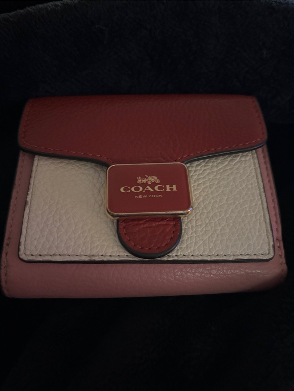 Coach Pepper Wallet in colorblock leather, pink, white, and red design
